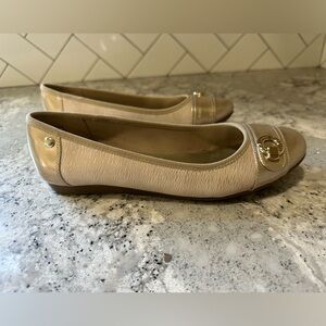 Anne Klein Sport Women’s champagne and silver ballet flats